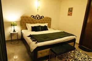 Velveteen w in-house bar 3bhksaket BricasaStays