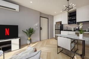 Delos 1BR Suite — The Title Legendary BangTao