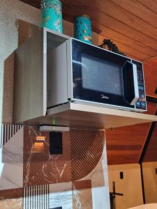 Aframe romântico de luxo na serra Cabana Aguimô