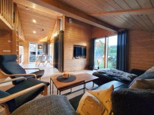 Schwarzes Holzferienhaus mit Sauna -- L I E B L I N G S P L A T Z -- an der Ostsee, Zierow bei Wismar, Strand 500m, alles inklusive