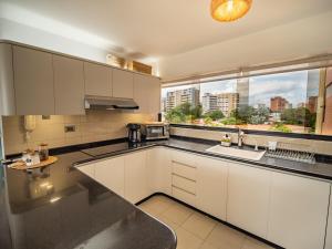 Beach front 9 min to airport DosLocosDeViaje