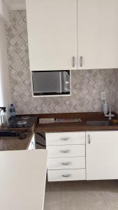 Flat muito confortável ao lado da pracinha