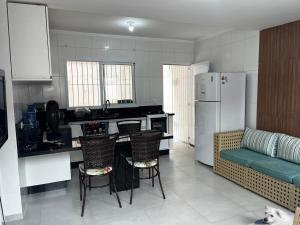 Casa pé na areia - Bertioga