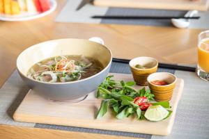 Restaurant, Fusion Suites Saigon in Ho Chi Minh City