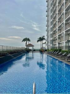 Coast Residences Near MOA and NAIA Luxury Bay View with Pool