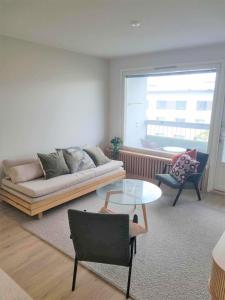 Moderni city kattohuoneisto