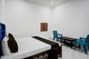 Hotel O by OYO Radha Raman Guest House