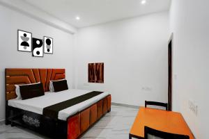 Hotel O by OYO Radha Raman Guest House