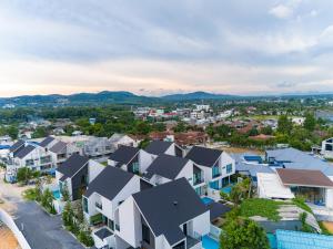 BangTao 4-Bedroom Brand New Modern Luxury Villa 2024 Minimalist Design Spacious 15-meter L-Shaped Swimming Pool Ideal for Guests