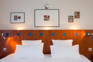 Hotels The Originals Boutique, Hotel Le Pariou, Issoire (Qualys-Hotel) : photos des chambres