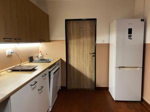 Apartmány ve sportovní hale