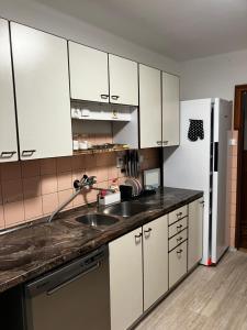 Apartmány ve sportovní hale