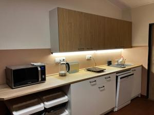 Apartmány ve sportovní hale