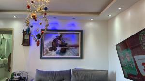 01 quarto em meu apartamento comigo hospedado