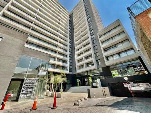 Hermoso depto estudio frente a Mall Plaza Egaña