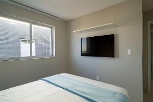 Apto 2 quartos a 140m da praia