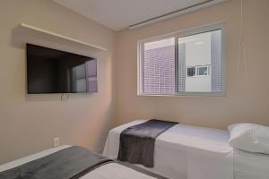 Apto 2 quartos a 140m da praia