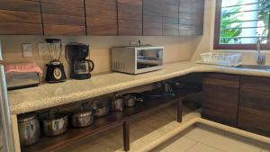 Ground Floor Condo with Pool & Garden Near Beach