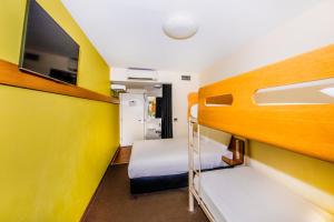 Standard Queen Room with Bunk Bed room in ibis budget Sydney Olympic Park