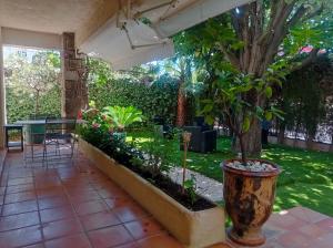 Appartement t2 rez de jardin villa proximité plage et centre