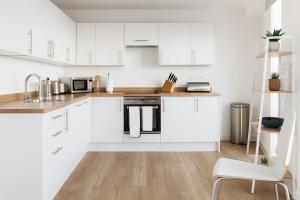 Designer Penthouse in Manchester with Parking