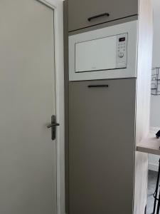 F2 neuf, centre ville, terrasse, WIFI, garage en option