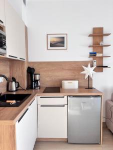 Nadmorski Relaks - komfortowy apartament blisko plaży w Sunset Resort