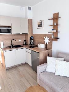 Nadmorski Relaks - komfortowy apartament blisko plaży w Sunset Resort