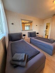 Zentrales Apartment für bis zu 5 Personen mit Balkon, Parkplatz, Waschmaschine & direkten Einkaufsmöglichkeiten