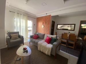 APARTAMENTO COM SUITE EM CONDOMÍNIO FECHADO com estacionamento próprio