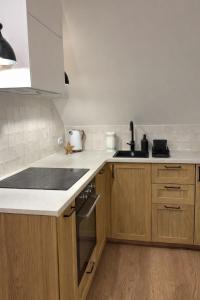 Leśne Chatki - Apartamenty Świerk i Sosna