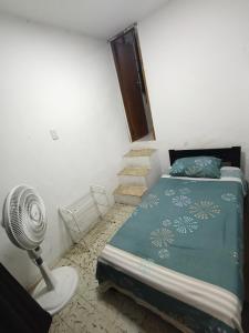 Habitación con medio baño en el barrio ciudad jardín Barranquilla