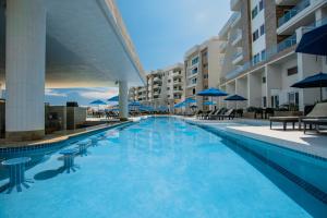Amazing Sunset Caribe 2-Bedroom Condo with Resort-Style Comfort