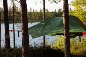 Capture Nordic Wilderness Camp - Baumzelt