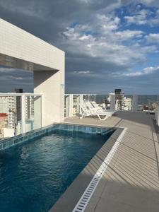 Apto Home & Club em Capão da Canoa