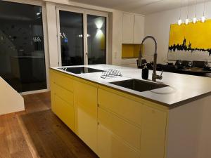 Spacious and Stylish Two-Level Retreat