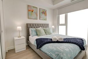 Modern High-Rise Condo w City Views & Balcony