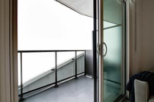 Modern High-Rise Condo w City Views & Balcony