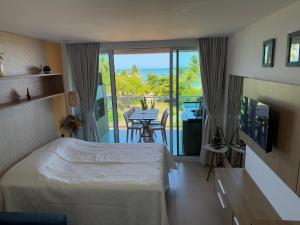 Beachfront flat Rooftop-Pool-Gym-Gourmet area