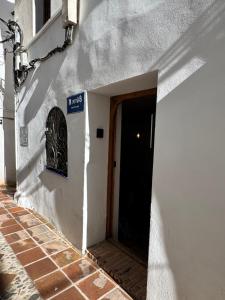 Casa Maroto - Boutique Stay in het hart van Comares, Rooftop terras, uitzicht op zee en bergen, gratis wifi