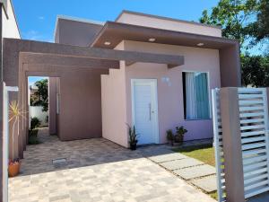Casa aconchego, lugar tranquilo p4, Pet friendly, Garagem