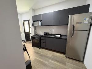 Apto 2 qts 350m da praia no centro BC EAN0104