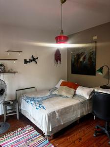 Habitación doble con balcón y pileta en las sierras Unquillo