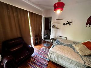 Habitación doble con balcón y pileta en las sierras Unquillo