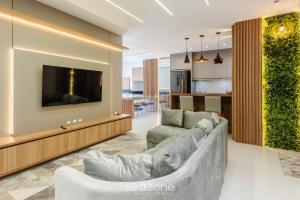 Aptos em prédio a 90 m da praia de Perequê - RIHs