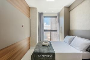 Aptos em prédio a 90 m da praia de Perequê - RIHs