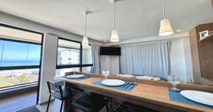 Studio para casais com varanda e vista mar