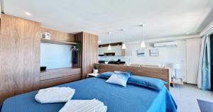 Studio para casais com varanda e vista mar