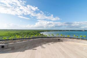 Oceanfront 3BR Natural Design Condo - Tankah