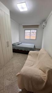 Apto 3 quartos com garagem - Aconchego pé na areia